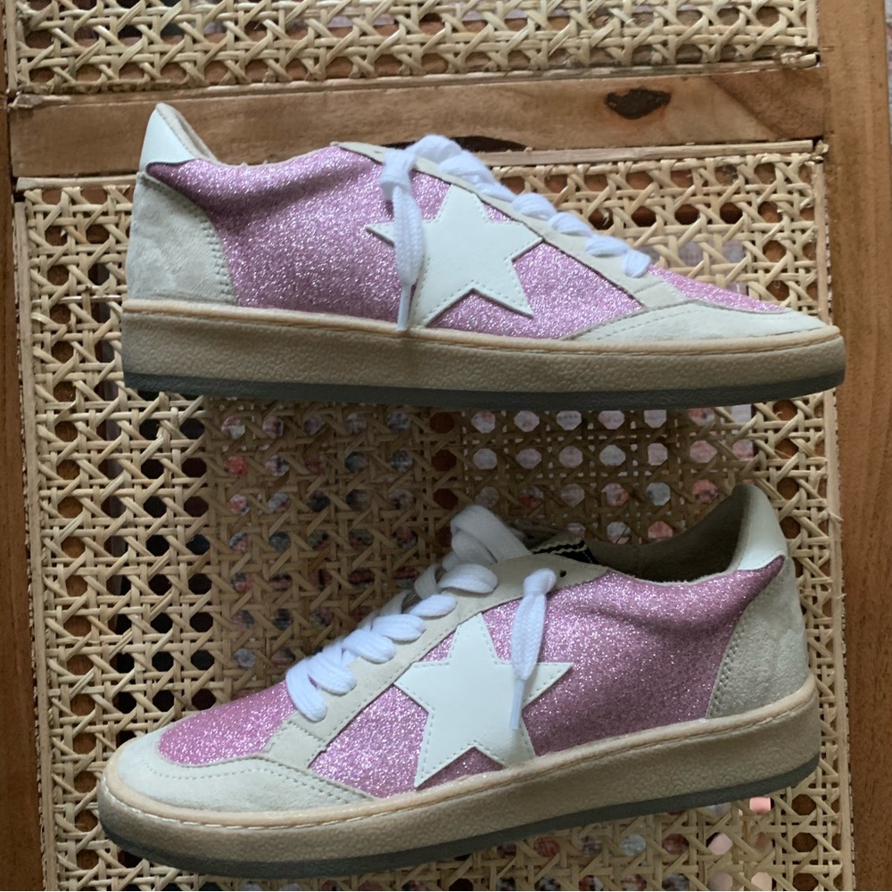 Pink and white sneakers